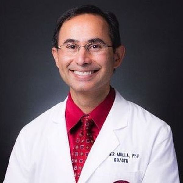 Portrait picture of doctor Zuber Mulla